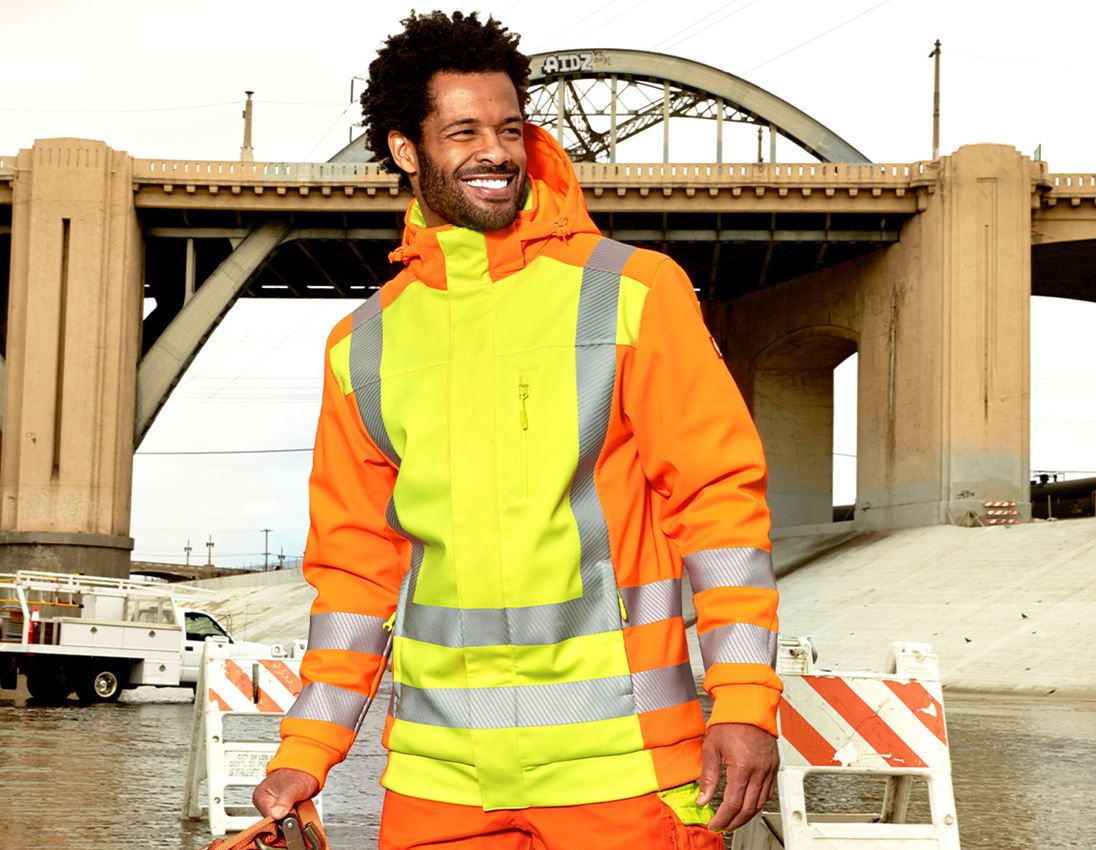 Pracovné bundy: Reflexná zimná softshellová bunda e.s.motion 2020 + výstražná žltá/výstražná oranžová
