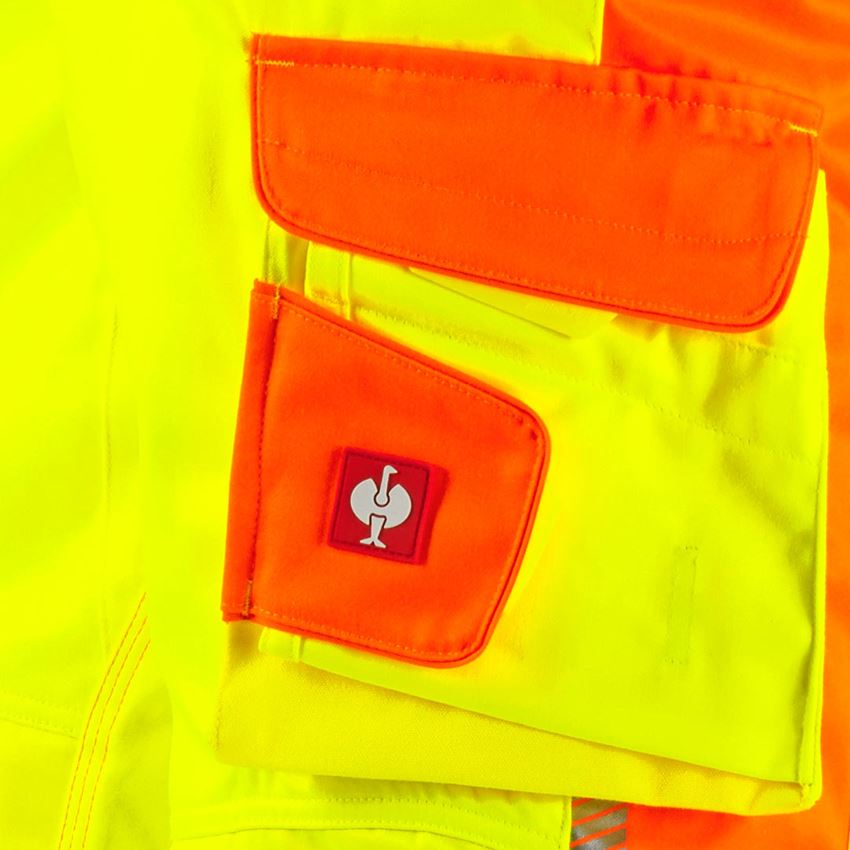 Témy: Reflexné ochranné nohavice e.s.motion 2020 Zima + výstražná žltá/výstražná oranžová 2