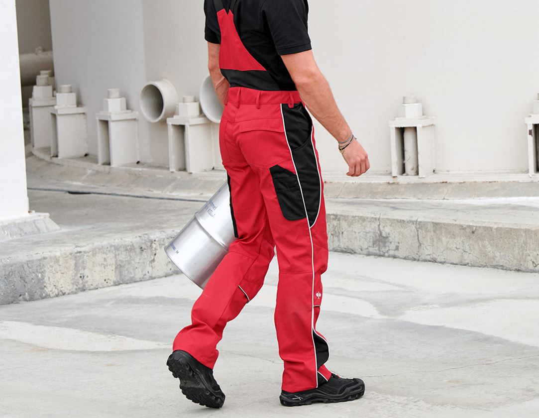 Pracovné nohavice: Nohavice s náprsenkou e.s.active + červená/čierna 1